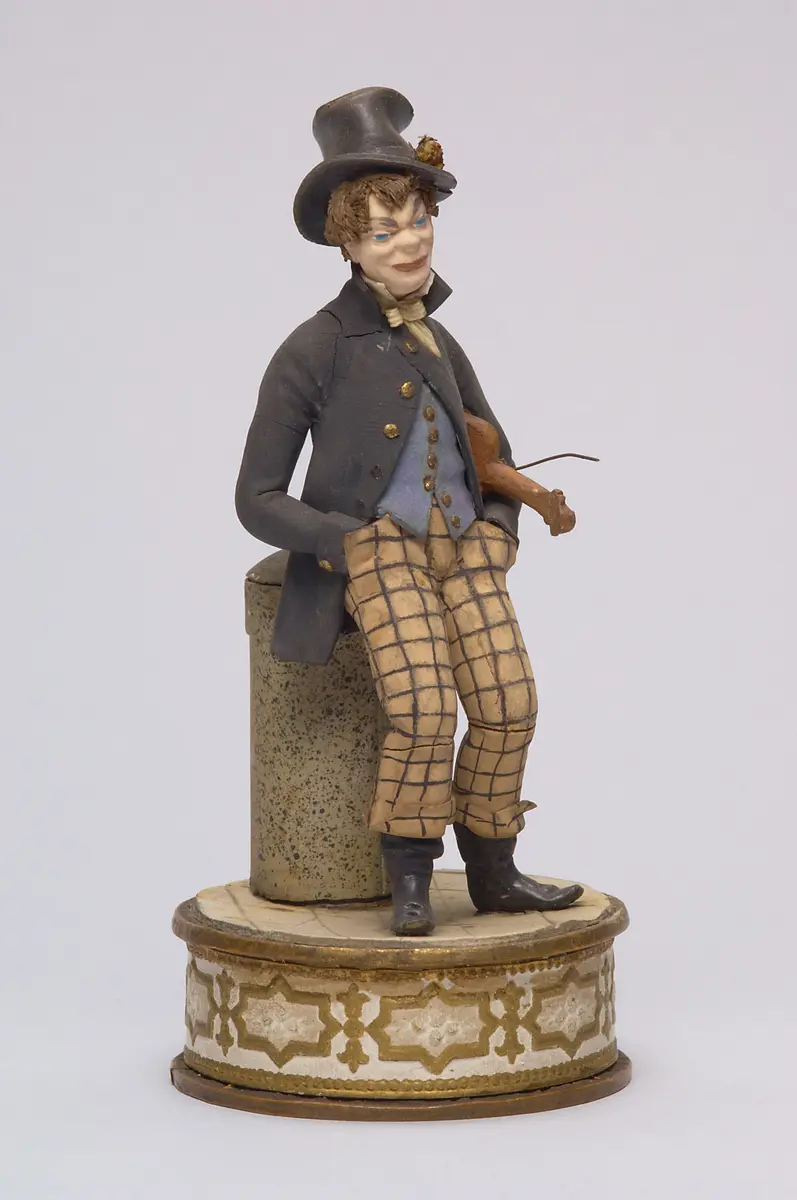 Der glücklose Fiedler - Tragantfigur