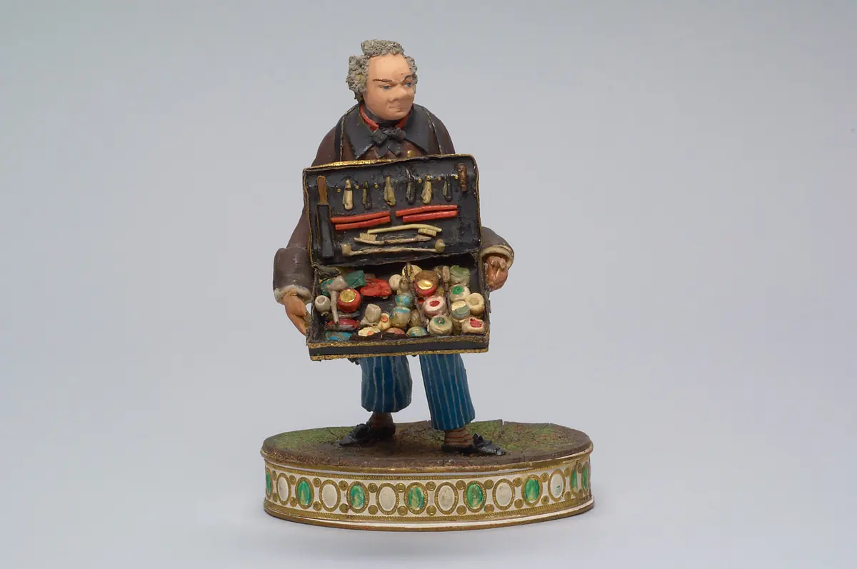Bauchlandenhändler - Tragantfigur