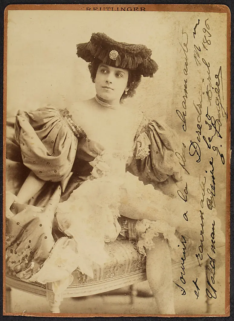 E. Lougére